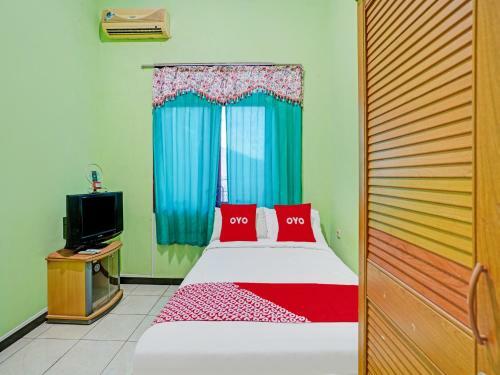 Hotel Oyo 90611 Griya Kutisari V Residence