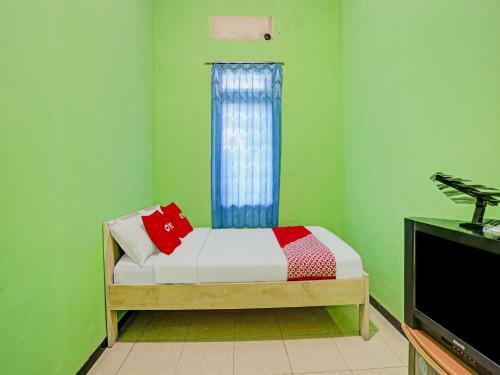 Hotel Oyo 90611 Griya Kutisari V Residence