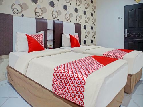Oyo 90386 Hotel Mangga Dua Makassar