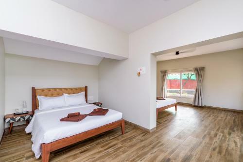 Villa Saffronstays Coral Hues