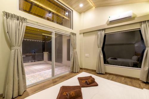 Villa Saffronstays Coral Hues