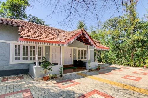 Hotel Whispering Woods By Aura Hospitality