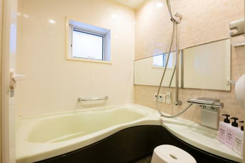 Londonbushotel & Wooddy