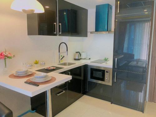 Apartamento Grand Avenue Pattaya Condos 1