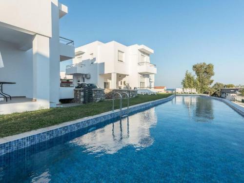 Welcoming Holiday Home In Gennadi With Shared Swimming Pool