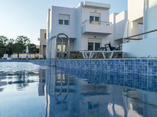 Ravishing Holiday Home In Gennadi With Shared Swimming Pool