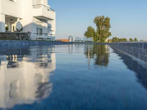 Ravishing Holiday Home In Gennadi With Shared Swimming Pool