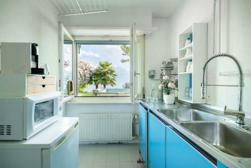Apartamento 1 Bedroom With Lake View & Garden
