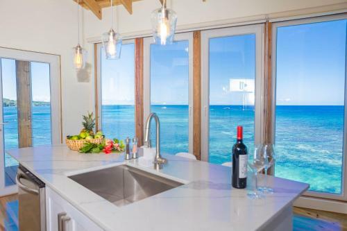 Awesome Over The Water Overlooking West End - Aire Agua Home
