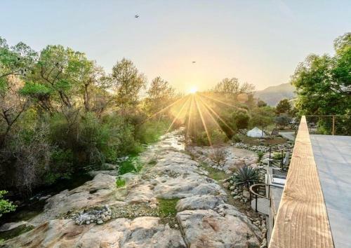 Reyium - A Conscious Riverfront Private Resort