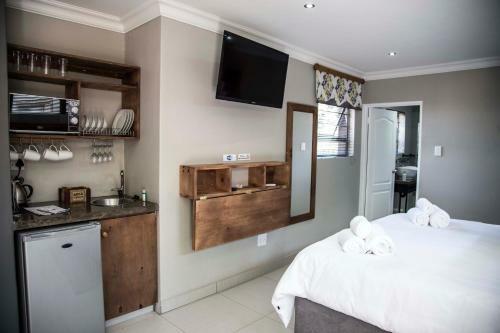 Hostal Touching Senses Garden Cottages
