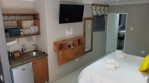 Hostal Touching Senses Garden Cottages