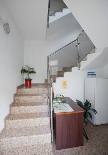 Hostal Amolls Restaurant I Habitacions