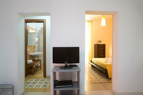 Apartamento The Flowered Courtyard Srl