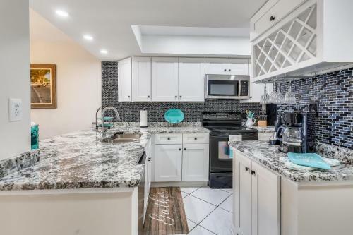 Land's End 404 Building 3 Top Floor With Stunning Water View