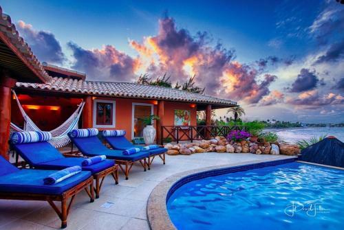 Casa Monte Belo -ferias Alto Padr�o- Beachfront Vacation