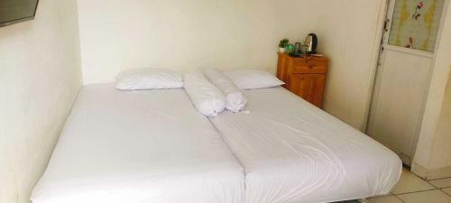 Hotel Express O 91277 Atiq Homestay Syariah
