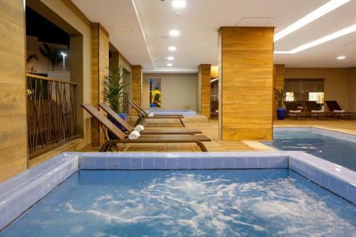 Apartamento No Ol�mpia Park Resort (Melhor Pre�o!)