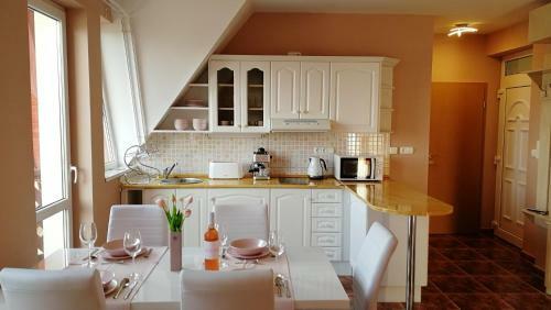 Lelle Central Grand Apartman