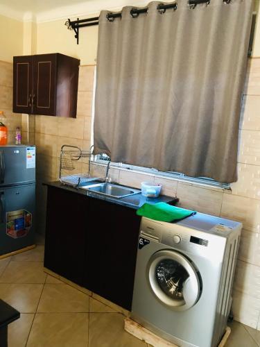 Apartamento Amani Homes 7