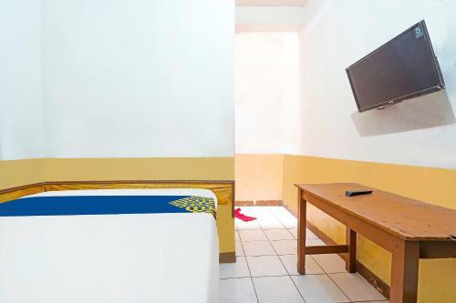 Spot On 91444 Hotel Arimbi