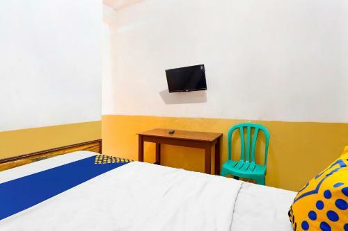 Spot On 91444 Hotel Arimbi