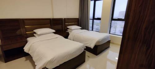 Apartamento Al Noor Suites