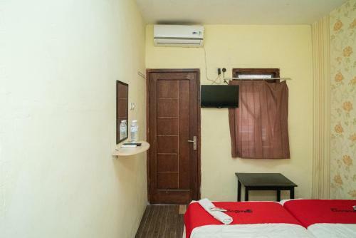 Hotel Reddoorz Near Cyber Mall