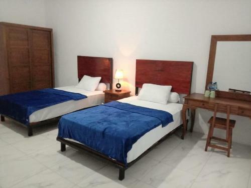 Hotel Dekamil Cottage Villa Kebun