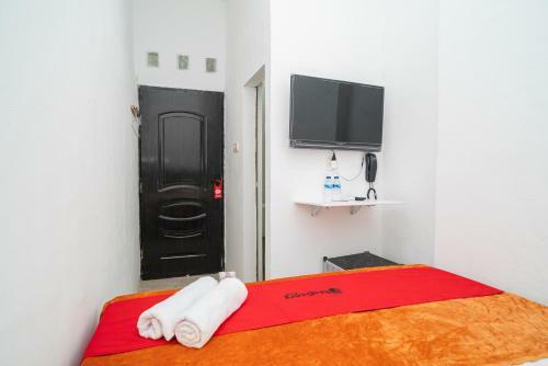 Hotel Reddoorz @ Aralia Harapan Indah
