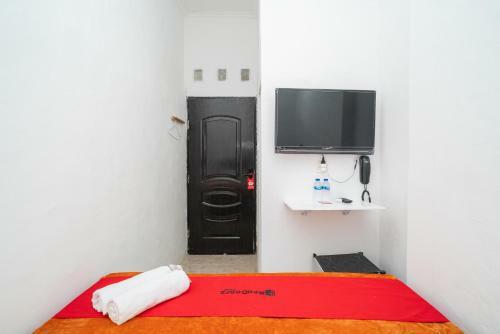 Hotel Reddoorz @ Aralia Harapan Indah