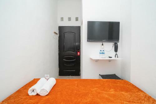 Hotel Reddoorz @ Aralia Harapan Indah