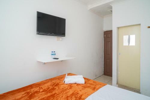 Hotel Reddoorz @ Aralia Harapan Indah