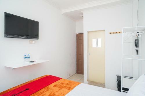 Hotel Reddoorz @ Aralia Harapan Indah
