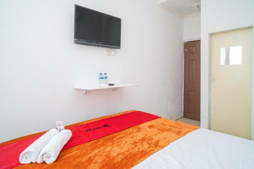 Hotel Reddoorz @ Aralia Harapan Indah