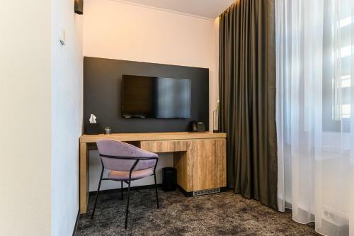 B The Hotel