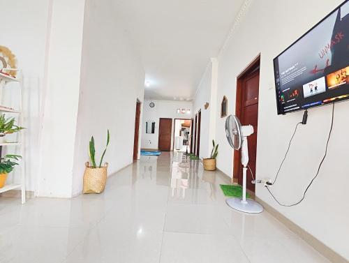 Hostal Homey Guesthouse Kertajaya (Syariah)