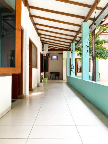 Hostal Homey Guesthouse Kertajaya (Syariah)