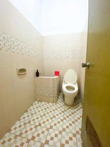 Hostal Homey Guesthouse Kertajaya (Syariah)