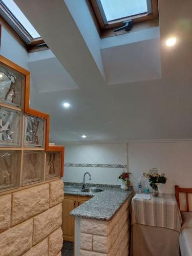 Apartamento La Buhardilla. Aparcamiento Exterior Privado