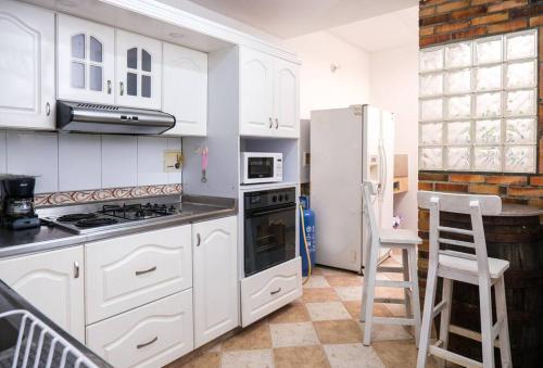 Apartamento Manila, Cultura Y Buena Mesa.