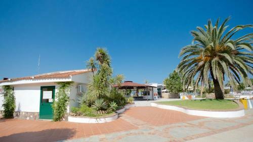 Viviendas Turisticas Villaggio Le Palme