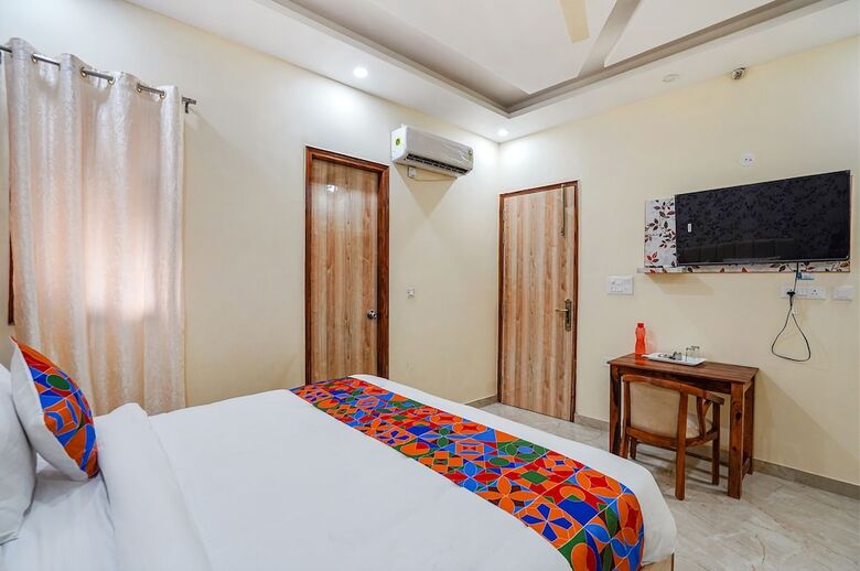 Fabhotel Ada Residency
