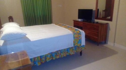 Hostal Palm Bay Guest House & Restaurant