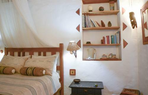 Hostal Old Thatch Lodge