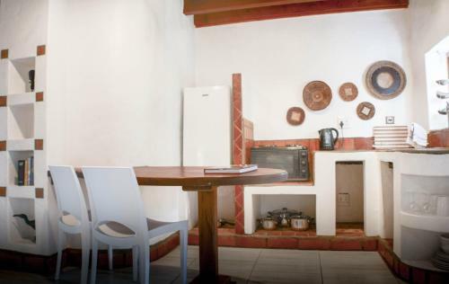 Hostal Old Thatch Lodge