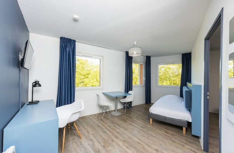 Residencia Teneo Suites