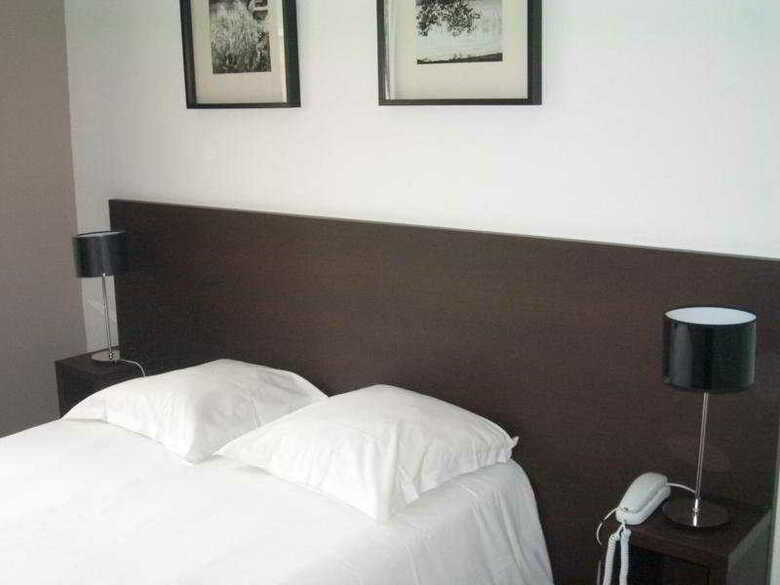 Residencia Teneo Suites