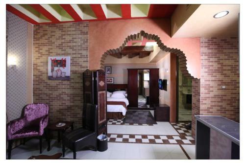 Apartamento Roomi Suites Hotel