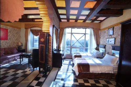 Apartamento Roomi Suites Hotel